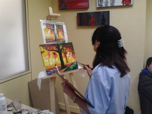 Alumnos pintando en la Academia Romaral Art Torrent
